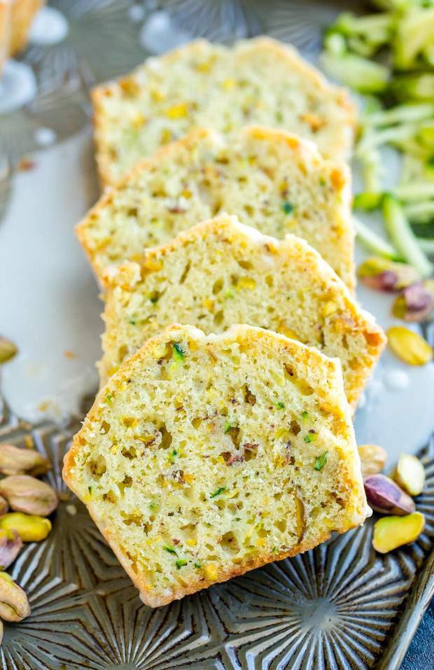Lemon Pistachio Zucchini Bread is a fun twist on zucchini bread that’s positively addictive! Try it with a sweet lemon glaze as a dessert bread or dive in as is for a tasty breakfast bread to kickstart your day!