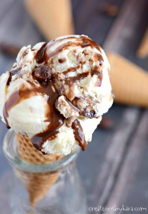Tin Roof Sundae Ice Cream . . . vanilla ice cream with swirls of homemade chocolate sauce and crunchy chocolate covered peanuts. A flavor explosion in every luscious bite!