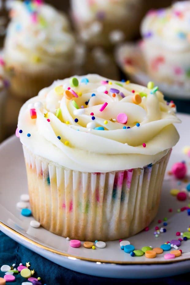 Soft, light, and fluffy, these sweet confetti cupcakes are modified from my popular funfetti cake recipe! These cupcakes are packed full of colorful sprinkles and made with a simple white cake base, then topped off with a sweet vanilla buttercream (and, of course, sprinkles!).
