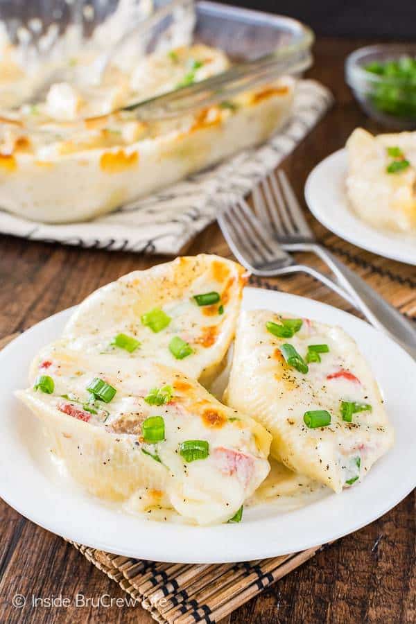 A creamy cheese filling makes these Sausage Alfredo Stuffed Shells a delicious and easy pasta dinner that can be on the table in 30 minutes.