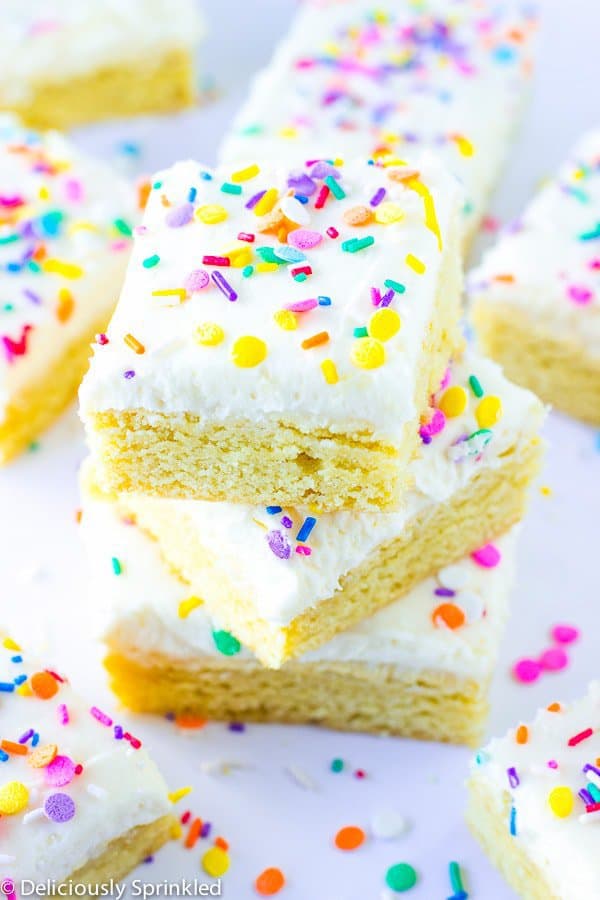 These easy to make Confetti Sugar Cookie Bars taste just like a frosted sugar cookie but they are almost better! These bars are perfect for a party when you need a quick dessert and you don’t have time to bake and frost a ton of sugar cookies