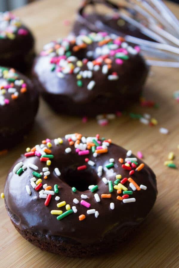 Super moist & fudgy, this easy recipe for baked Double Chocolate doughnuts with chocolate glaze is a chocolate lover’s dream! These double chocolate donuts are way better than the ones from the bakery, and there’s no deep frying.
