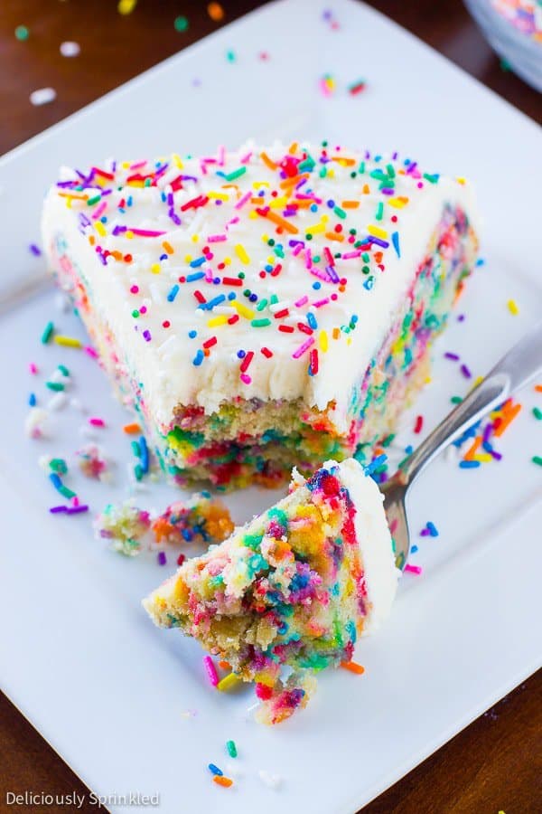 This Homemade Funfetti Cake is a delicious, light and fluffy cake that not only tastes a million times better then a cake box mix, it’s also super easy to make.