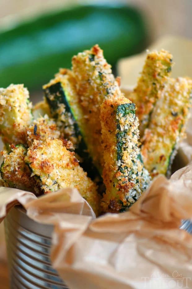 Your new favorite way to eat zucchini! These Baked Parmesan Zucchini Fries are loaded with flavor and baked to golden perfection! The perfect way to use up your summer bounty!