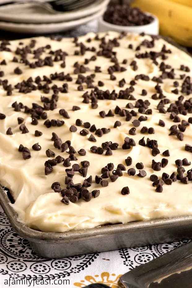 This Banana Chocolate Chip Sheet Cake with Cream Cheese Frosting is easy to make and absolutely delicious!