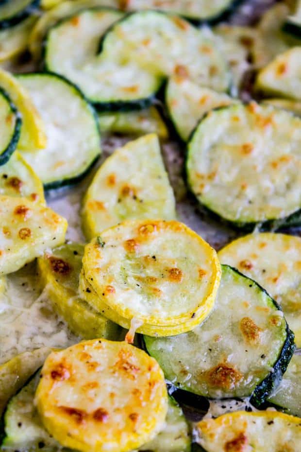 This crispy parmesan crusted zucchini and yellow squash recipe is possibly the easiest summer side dish of all time, and a great way to use up garden veggies! I have a hard time not eating the entire batch single-handedly.
