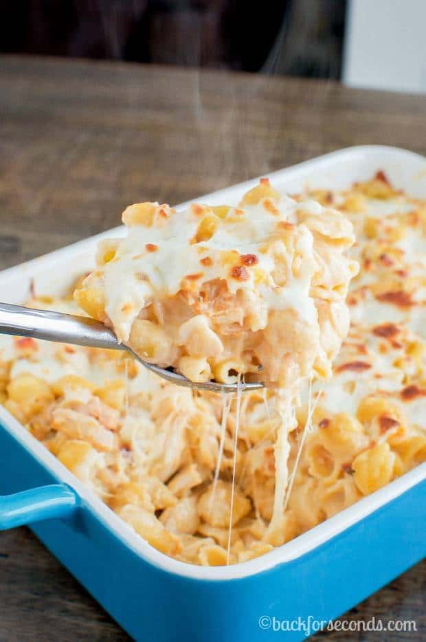 This Buffalo Chicken Alfredo Bake is a quick and easy dinner that everyone will love. A spicy, cheesy casserole, great for busy weeknights, that is pure comfort food!