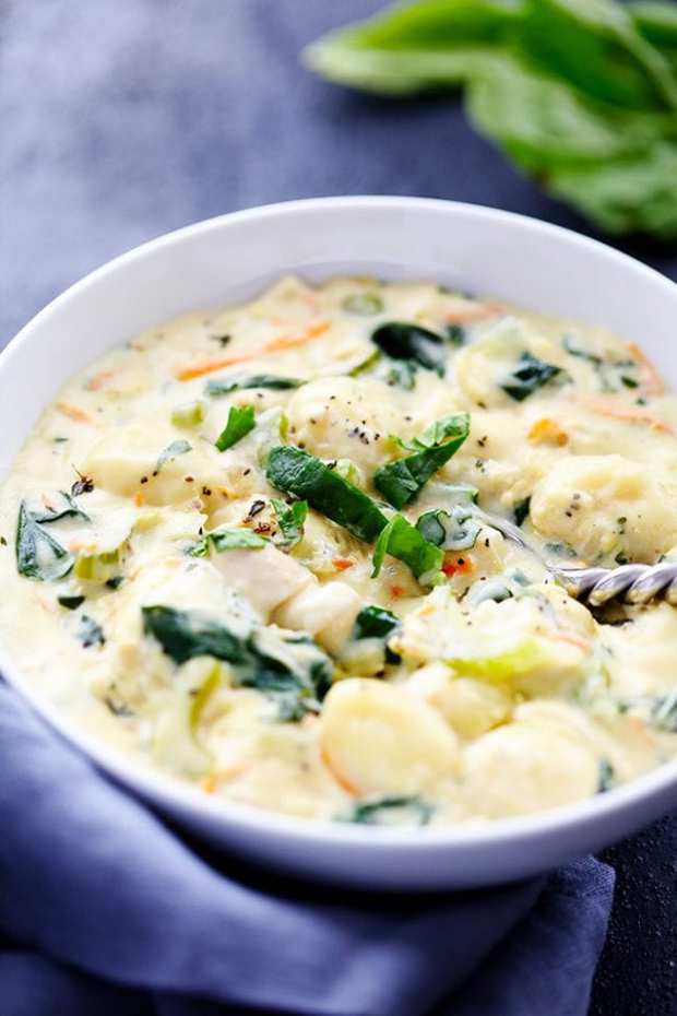reamy Chicken Gnocchi Soup has a thick and rich broth with shredded carrots, celery, chopped spinach, gnocchi and chicken hidden throughout.  This tastes even better than the Olive Garden!