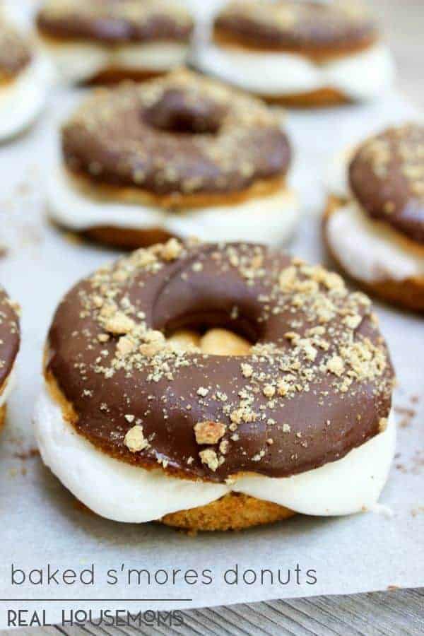Baked S’mores Donuts are a collision of two of my favorite summer favorite must haves: s’mores & donuts. A baked graham cracker donut, a gooey marshmallow center, dipped in chocolate and dusted with graham cracker crumbs.