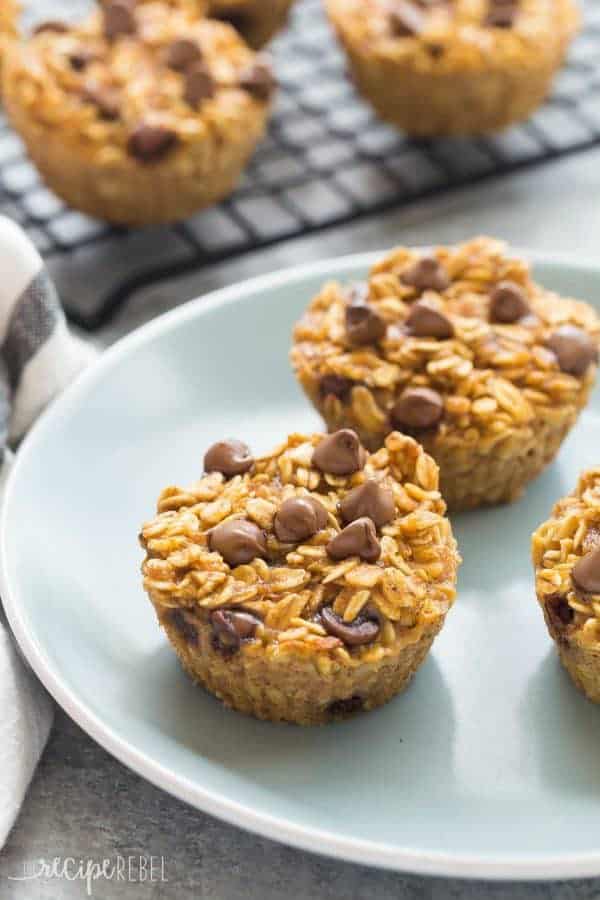 These Pumpkin Chocolate Chip Baked Oatmeal Cups are an easy and healthy breakfast, lunch or snack — low in calories, high in protein and fiber, make ahead and freezer friendly!