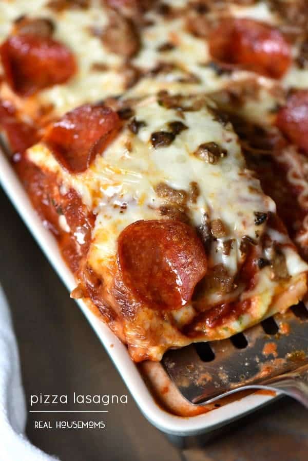 Pizza Lasagna is a new favorite weeknight meal for my entire family!! This recipe is so easy and can be made ahead for dinner on busy weeknights!