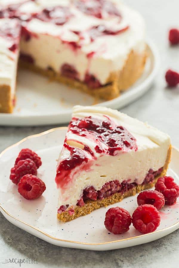White Chocolate Raspberry Cheesecake is an easy no bake cheesecake for summer! It is SO smooth and creamy and you don’t ever have to turn on the oven. It’s the perfect no bake dessert for showing off summer berries — strawberries or blueberries work just as well!