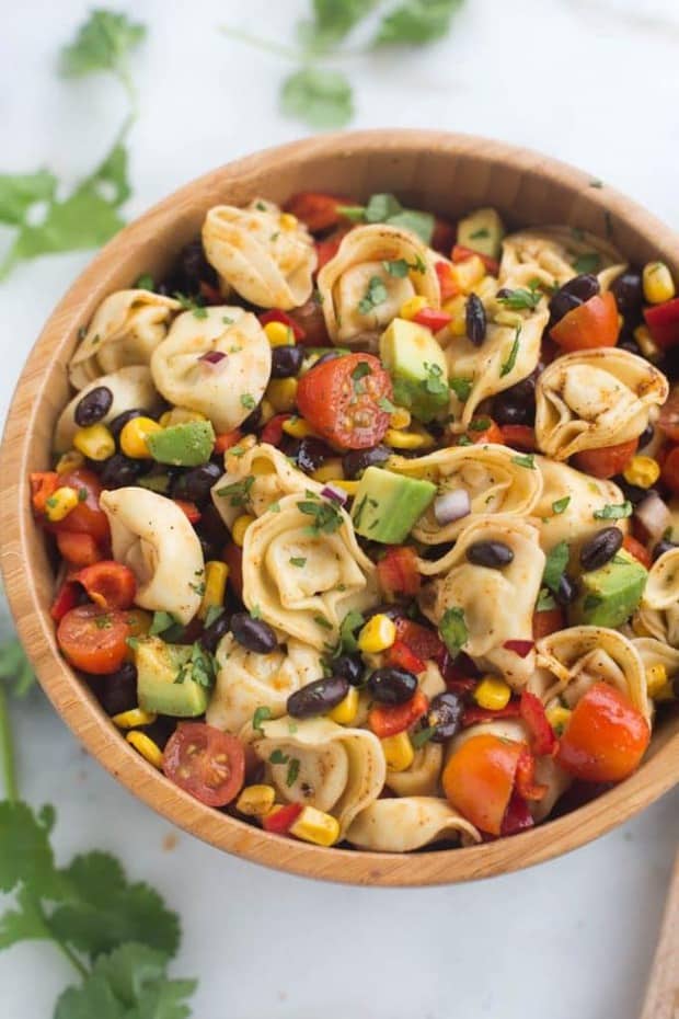 A fresh and easy southwest tortellini pasta salad that can be made in less than 30 minutes! It’s loaded with veggies and protein and coated in a deliciously simple and healthy southwest dressing.