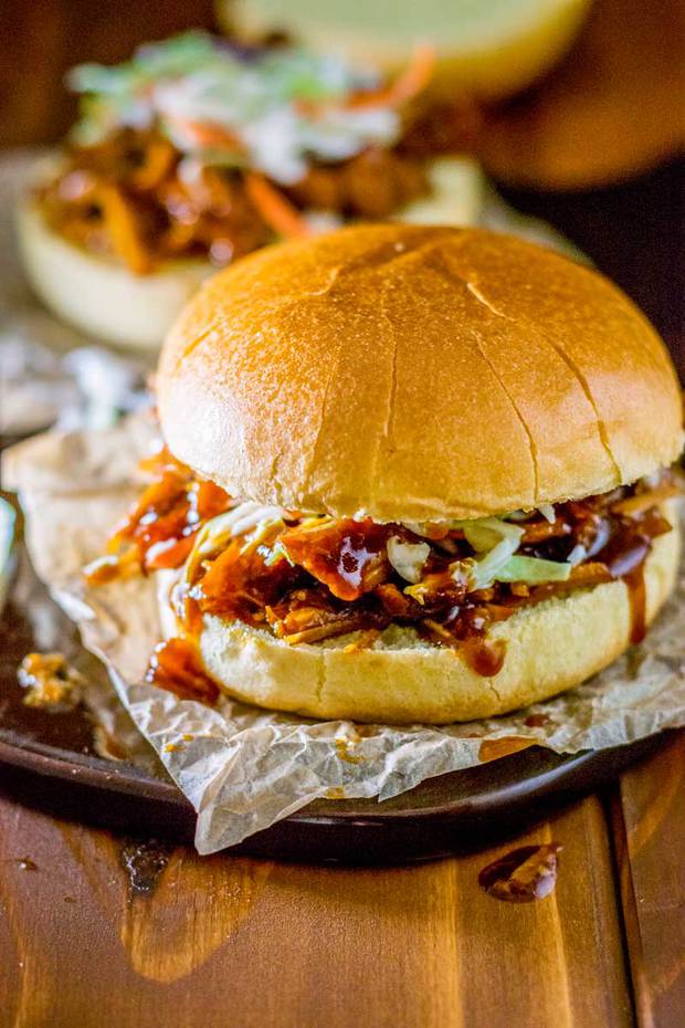Transform your favorite BBQ sauce into deliciously sweet crock pot pulled pork that goes perfectly with just about any sandwich or taco topping