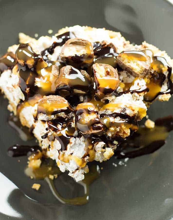 No Bake Twix Pie – This pie is no bake and super easy to make!  Creamy and cool filling loaded with Twix candy, topped with chocolate and caramel drizzle!
