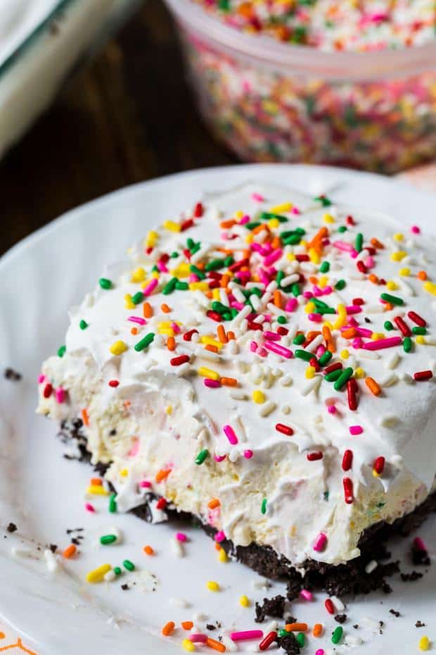 Birthday Cake Lush is a fabulously delicious pudding dessert that’s perfect for anytime you are craving birthday cake. With its super cool and creamy texture, this no-bake dessert is even better than birthday cake.