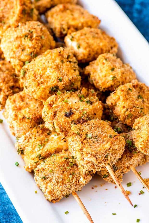 These tender and tasty Dijon chicken skewers are family-friendly and perfect for a big party or a quick weeknight dinner. With no need to marinade and being baked in the oven, these skewers come together in less than 30 minutes.