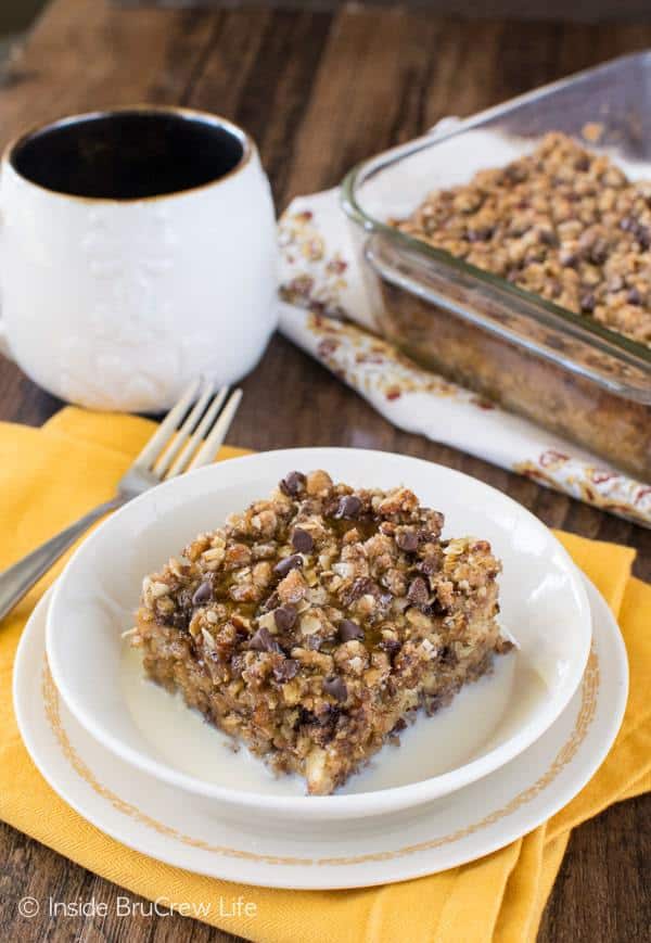 A crunchy topping on this Chocolate Chip Banana Streusel Baked Oatmeal will have you ready for breakfast in the morning. Enjoy a warm square with milk and drizzles of honey.