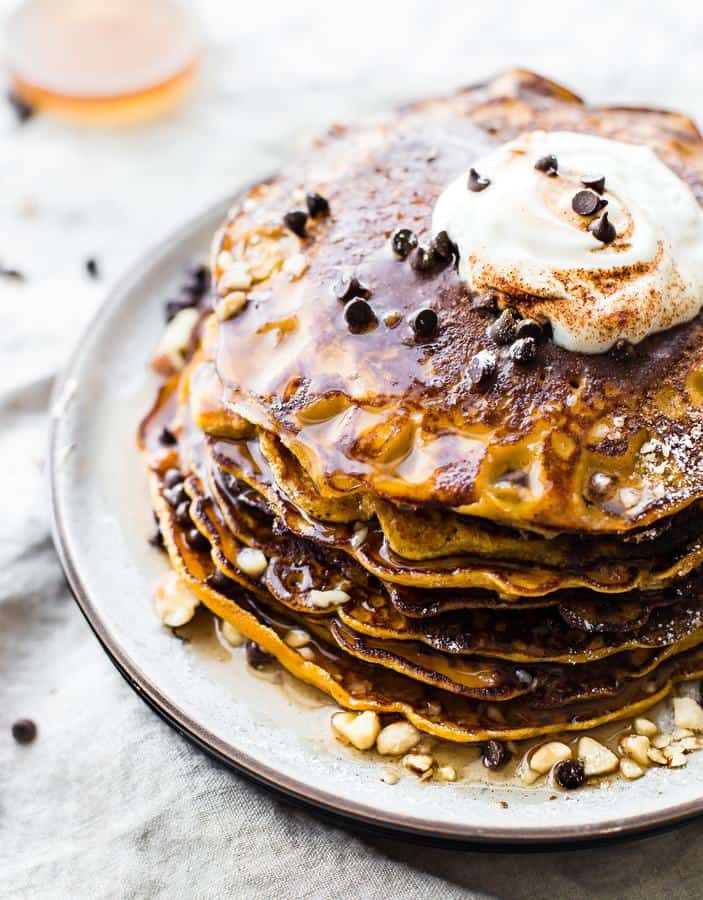  Flourless Carrot Cake Yogurt Pancakes are too good to be true! Protein packed, made with simple wholesome ingredients, lower sugar, gluten free, and oh so tasty! Just blend, cook, and serve!