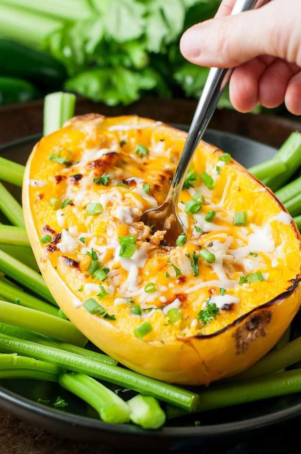  Cheesy Buffalo Chicken Spaghetti Squash is a totally crave-worthy lightened up version of the classic!