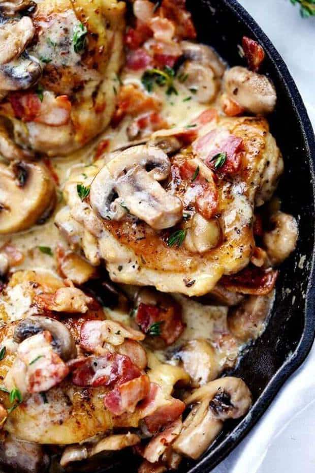 Creamy Bacon Mushroom Thyme Chicken is honestly one of the best skillet meals you will ever make!  Tender chicken with a creamy sauce with bacon, mushroom, and thyme.  The flavor is out of this world!