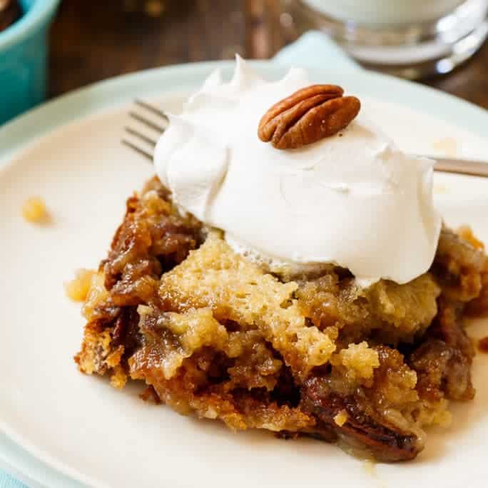 This Pecan Pie Cake tastes just like pecan pie but in cake form. I think it tastes even better than pecan pie. It’s made from a box of butter pecan cake mix with lots of butter, brown sugar, and eggs added.