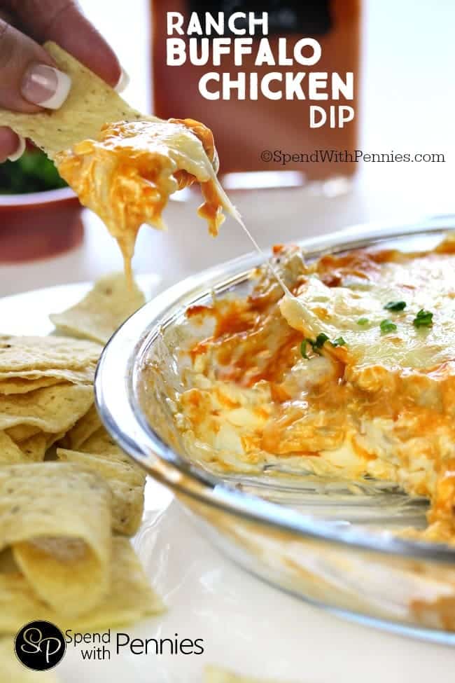 This is literally the perfect party dip!  Creamy, cheesy & spicy; this Buffalo wing flavored dip is loaded with shredded chicken and tons of yummy cheese!