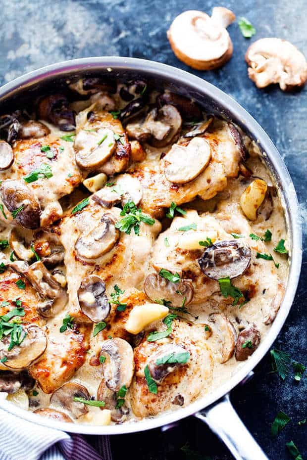 Tender and juicy chicken in the most amazing creamy and delicious garlic mushroom sauce!  This makes one incredible 30 minute meal!