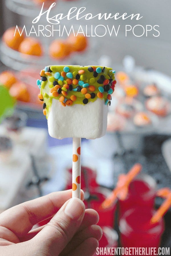 Introducing the simplest Halloween treat ever … Quick & Easy Halloween Marshmallow Pops!