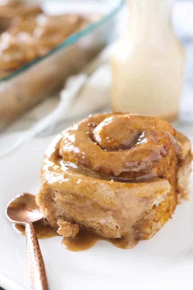 These pumpkin cake mix cinnamon rolls are made easier by starting with a cake mix then drizzled in a delicious brown sugar maple glaze! Your family will love waking up to these!