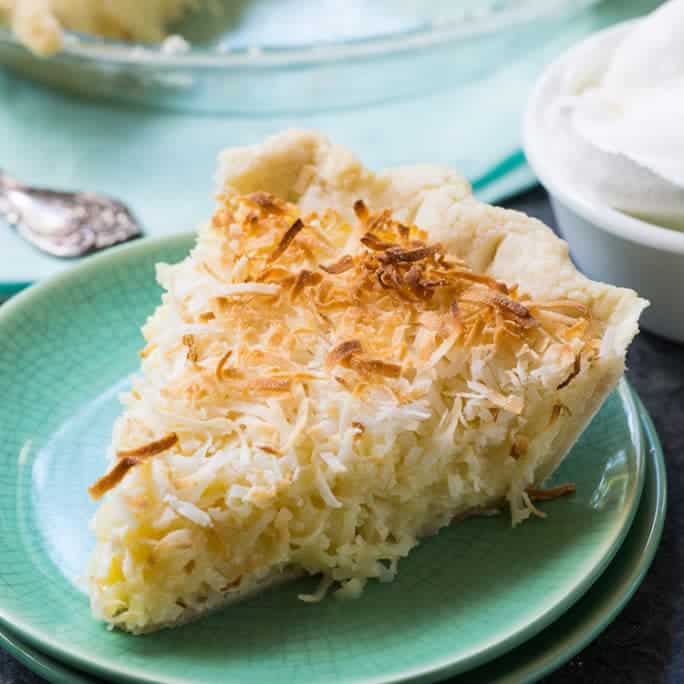 Coconut Macaroon Pie has a luscious custard filling with oodles of shredded coconut. The coconut on top gets a little bit browned and chewy and is such a wonderful contrast to the super sweetness of the custard.