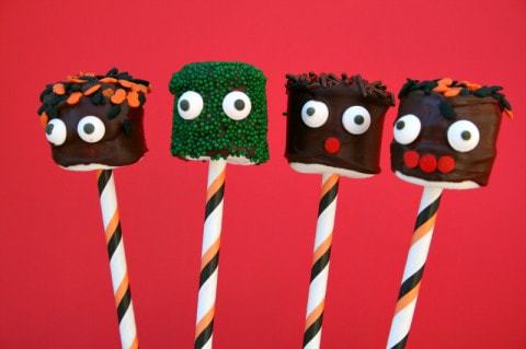 Marshmallows on a stick become Halloween monster heads with a little chocolate and some sprinkles — easy to do and they make a big impression!