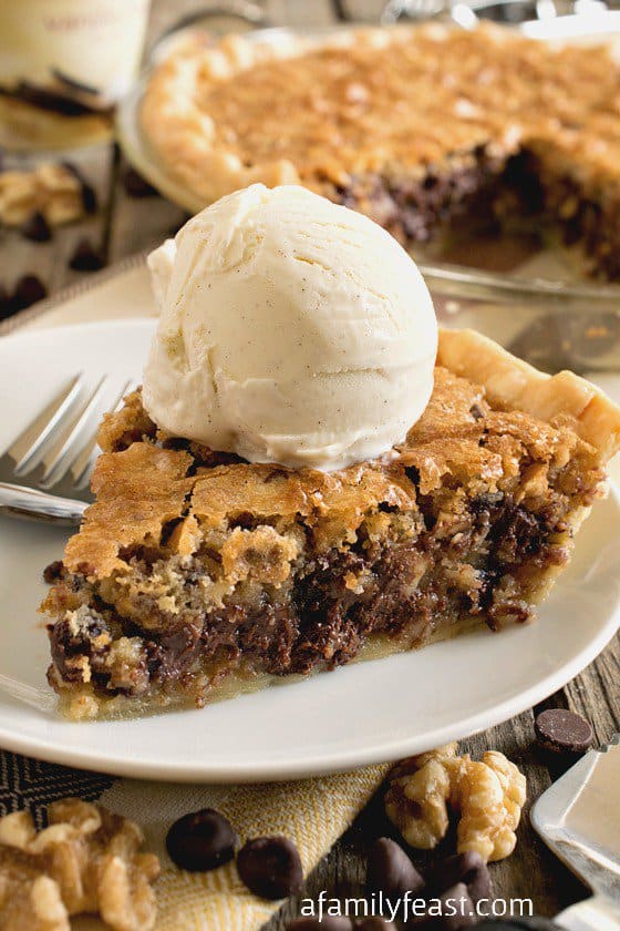 As this Toll House Chocolate Chip Pie bakes, it forms almost a crackly top – and when you bite into your slice it’s dense and soft and fudgy with crunch from the chopped walnuts.
