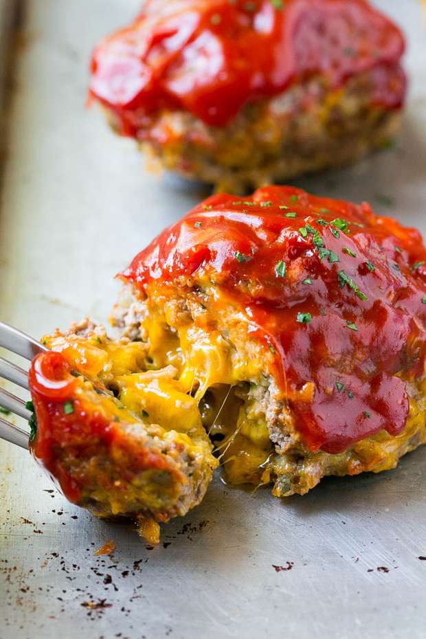 This Cheeseburger Meatloaf Recipe is individual meatloaf filled with bacon and cheddar cheese that are baked to perfection. Comfort food at its finest!