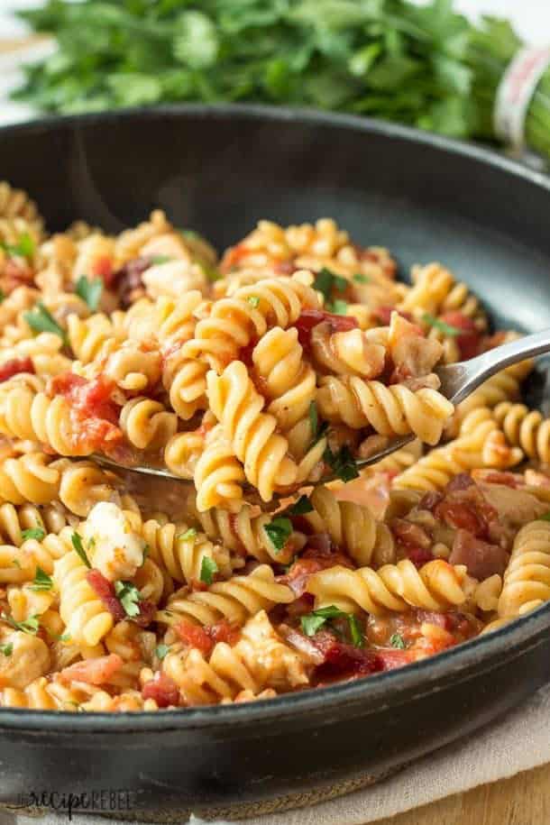 This One Pot BBQ Chicken Pasta with Bacon is SO easy and so good — hearty, cheesy and a little smoky from barbecue sauce. Includes step by step recipe video.
