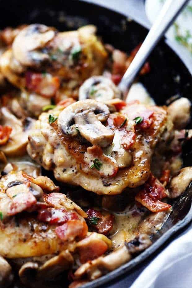 Creamy Bacon Mushroom Thyme Chicken is honestly one of the best skillet meals you will ever make!  Tender chicken with a creamy sauce with bacon, mushroom, and thyme.  The flavor is out of this world!