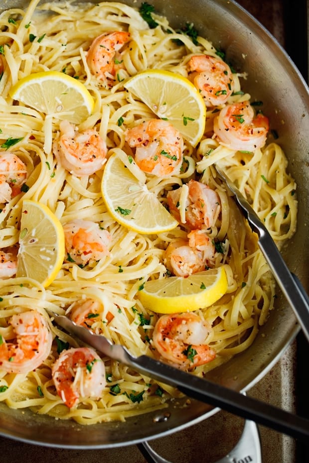 A bowl filled with pasta and vegetables, with Shrimp and Cream