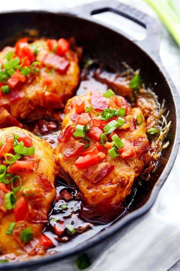 Skillet Monterey Chicken is a 30 minute meal that the entire family will fall in love with!   Smothered in BBQ sauce, monterey jack cheese and bacon this meal is full of flavor!