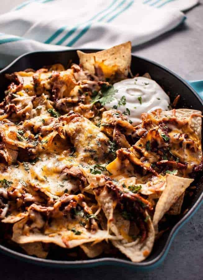 BBQ chicken skillet nachos are fast, easy, and delicious! The perfect game-day comfort food appetizer. Ready in only 25 minutes!