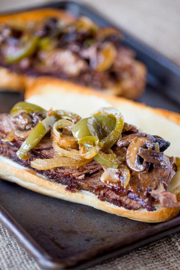 Slow Cooker Philly Cheese Steak Sandwiches that are so tender and flavorful you’ll feel like you’re in Philly. Perfect for a crowd!