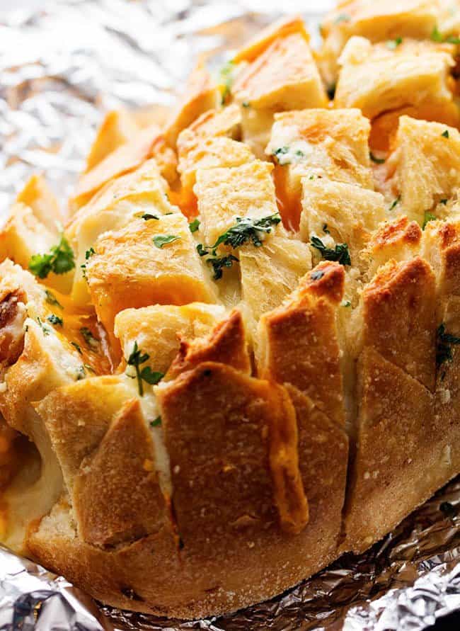 An amazing pull apart bread stuffed with three cheeses and a buttery garlic!  You won’t be able to get enough!