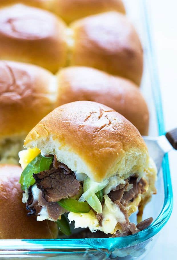 If you’re looking for  a hearty, filling and comforting appetizer for game day, any other gathering (or dinner!)  look no further.  These Philly Cheesesteak Sliders are your answer!