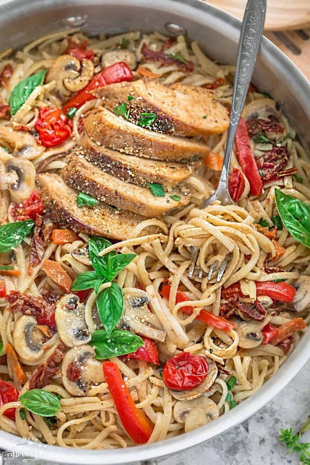  This One Pot Tuscan Chicken Pasta  is loaded with flavor and makes the perfect easy 30 minute weeknight meal.   Best of all, everything cooks in just one pan making clean up a breeze!