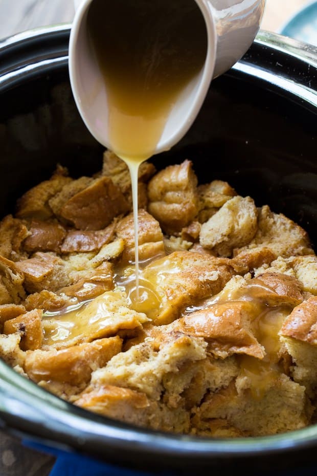 Crock Pot Tres Leches Bread Pudding is just the dessert for Cinco de Mayo. It’s so moist and rich and a vanilla sauce drizzled on top gives it extra sweetness.