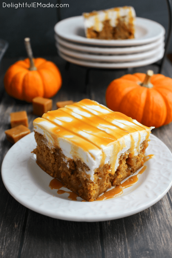 The ultimate fall dessert!  This pumpkin poke cake is drizzled with caramel sauce, frosted with a fluffy cream cheese frosting and topped with even more caramel sauce!  You’ll love every single morsel of this uber moist, delicious pumpkin cake!