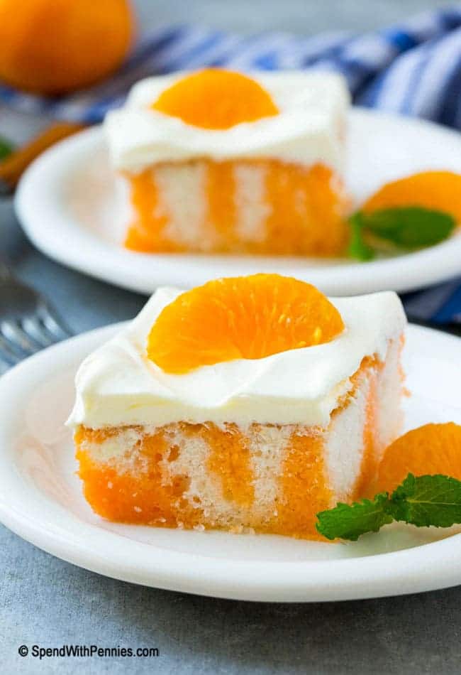 This orange poke cake is a fluffy white cake infused with orange flavor and topped with a quick and easy vanilla frosting making it taste just like our favorite childhood frozen dessert. It’s a easy dessert that’s a total crowd pleaser and perfect for any summer potluck!