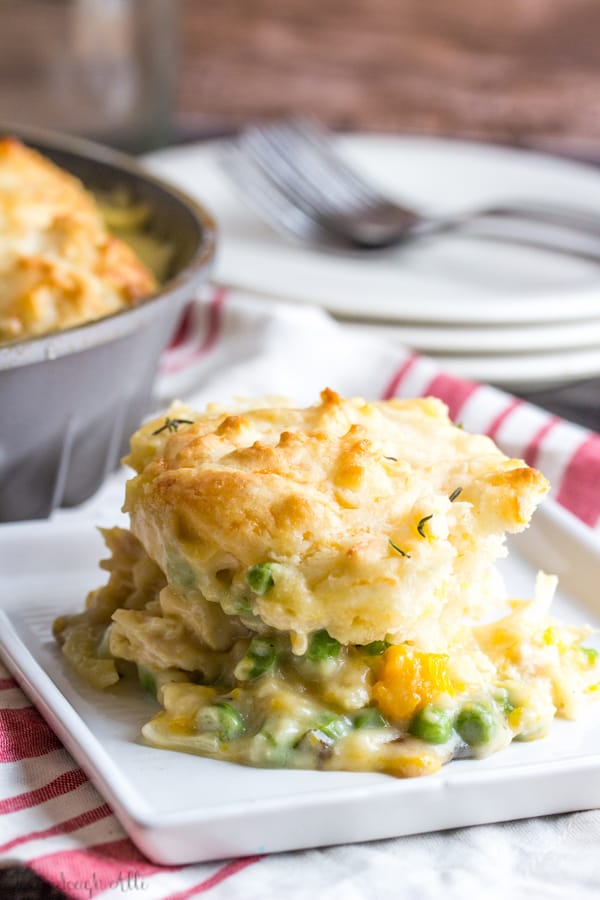 Creamy and delicious this Cheddar Biscuit Topped Harvest Chicken Pot Pie is full of hearty veggies and herbs and topped with soft and fluffy cheddar drop biscuits.