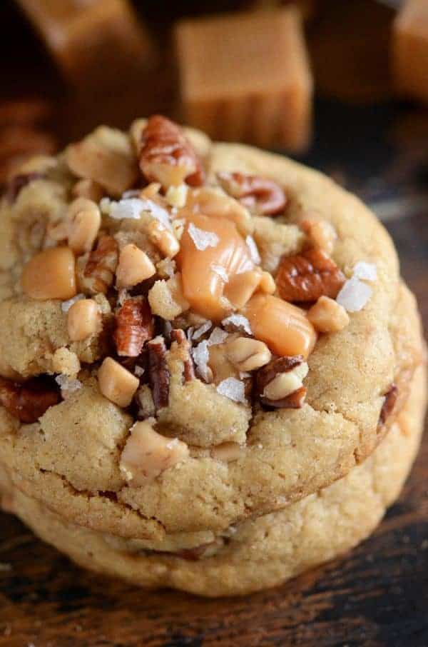 Salted Caramel Crunch Cookies: one-bowl, twenty minute, chewy brown sugar cookie with toffee bits, chopped pecans, sweet caramel bites and flaked sea salt!