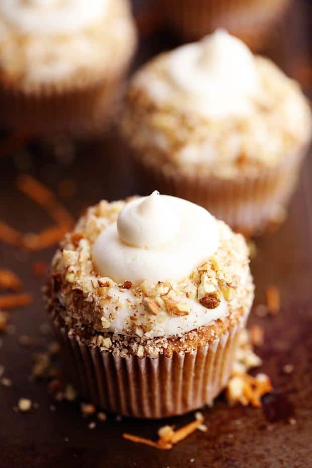The most perfect and moist spiced carrot cake cupcakes with a white chocolate cream cheese frosting!  These became one of my favorite cupcakes with the first bite!