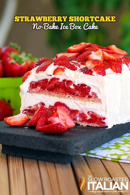 Layer upon layer of cookies, cream and luscious strawberries make up this insanely simple and delicious no bake strawberry shortcake ice box cake recipe.  The fabulous vanilla whipped cream frosting will certainly knock your socks off.